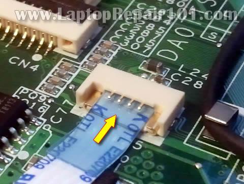 Insert touchpad cable Insert touchpad cable