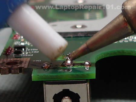 Sucking extra solder