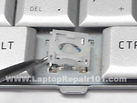 laptop keyboard keys. Remove key retainer